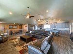 Spacious Living room with large sectional and TV